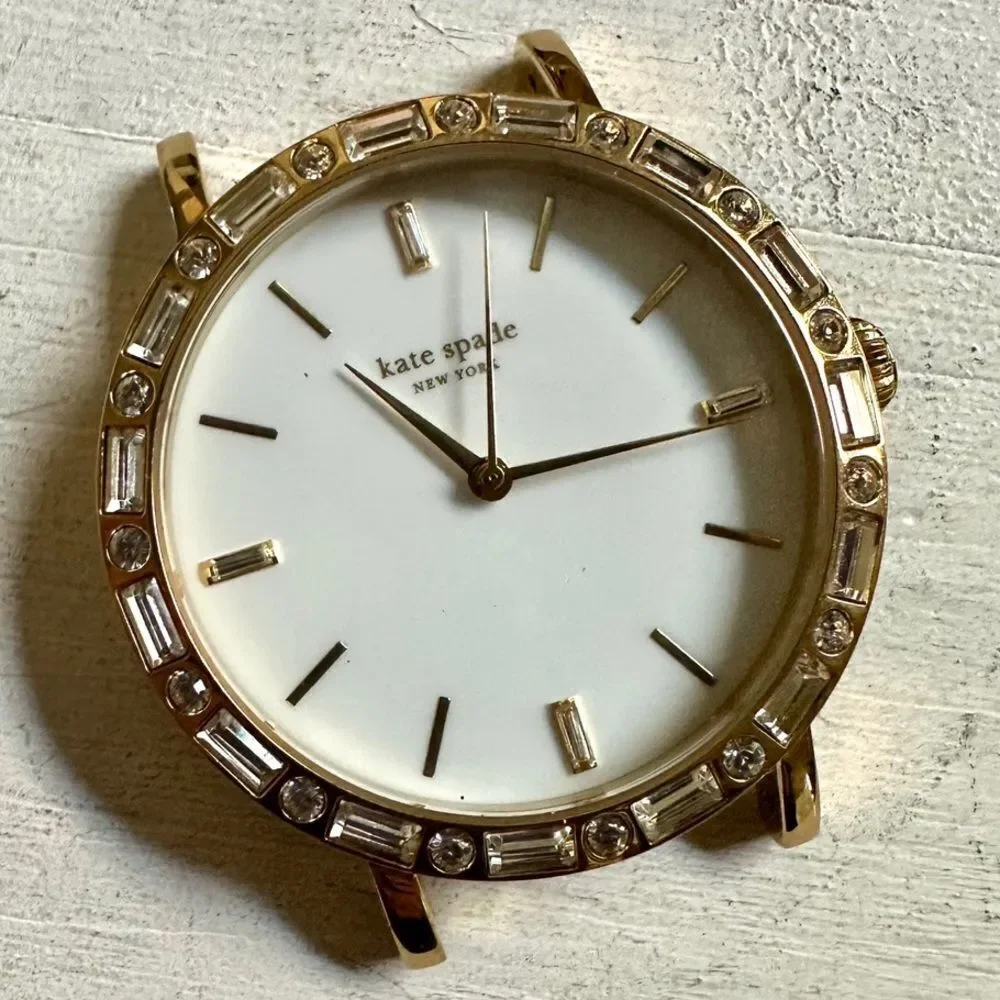 Kate Spade gold tone rhinestone watch face